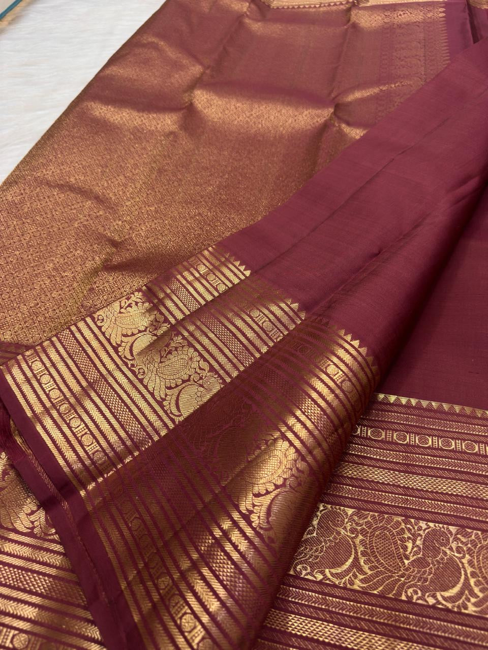Earthy Rose Kanjivaram silk saree with antique-gold Annam zari border
