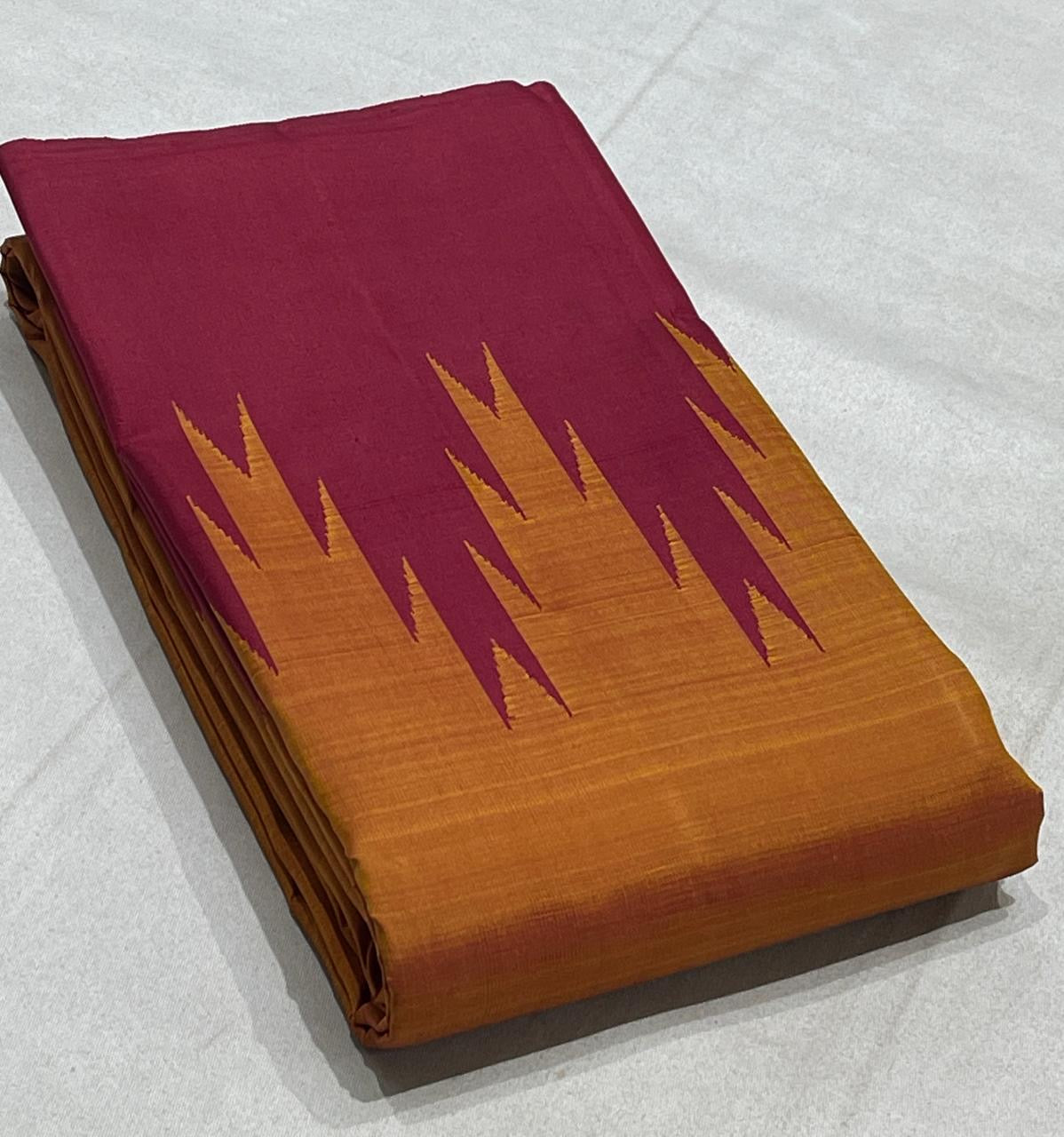 Kancheepuram silk saree in maroon with mustard border Thazhampoo Reku weave border detail