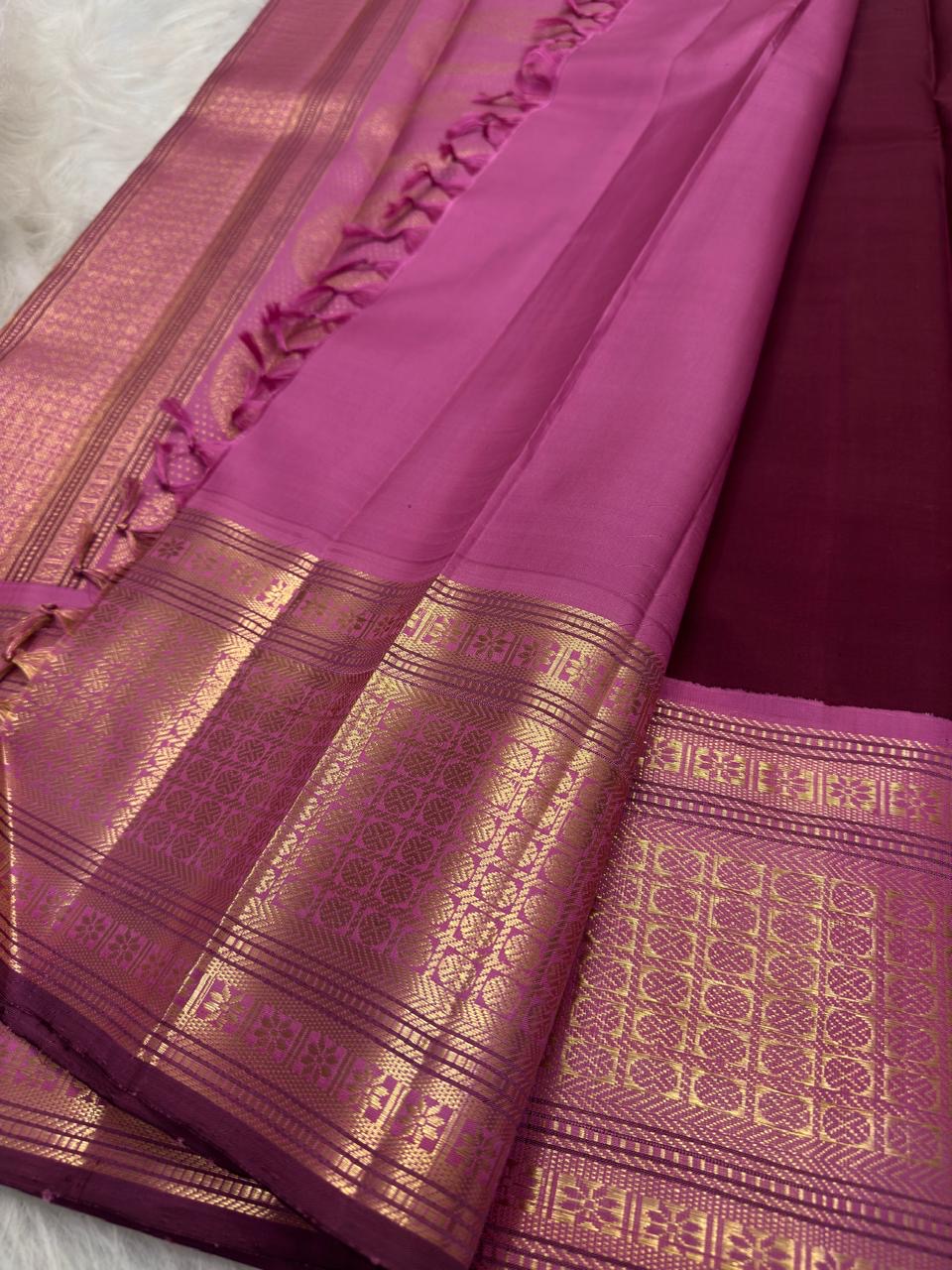 Burgundy Pure Silk Kanjeevaram saree with circular floral gold zari buttas