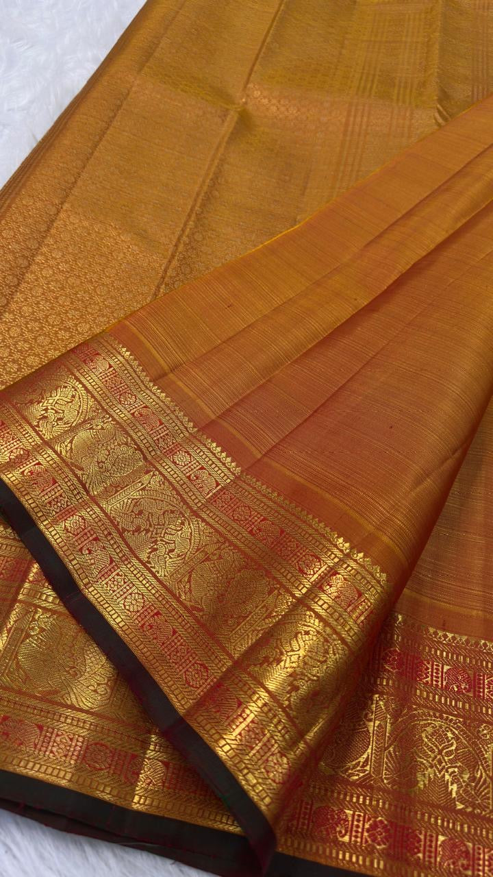 Burnished Ochre Gold Handwoven Pure Silk Kanjeevaram Vairaoosi Saree with Gold Zari Buttas and Traditional Zari Border