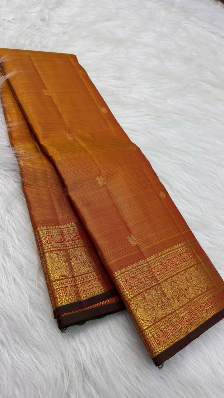 Burnished Ochre Gold Handwoven Pure Silk Kanjeevaram Vairaoosi Saree with Gold Zari Buttas and Traditional Zari Border