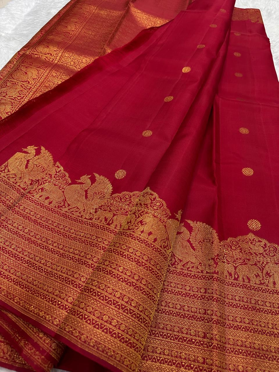 Temple vermillion red Kancheepuram silk saree with gold zari border