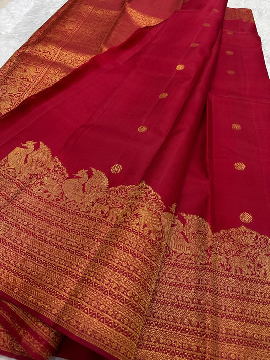 Temple vermillion red Kancheepuram silk saree with gold zari border