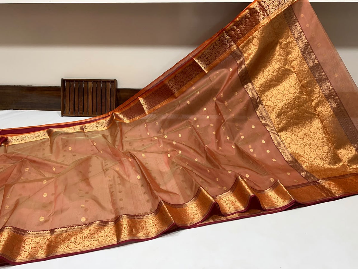 Burnished rust handwoven Chanderi silk with circular gold buttas