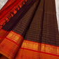 Kanjeevaram pure silk saree in burnt copper with contrast pallu and traditional zari finish