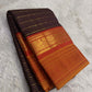 Burnt copper handwoven pure silk Kanchipuram butta saree with horizontal zari stripes