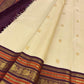 Deep Aubergine Purple Burnt Orange and gold woven border on Warm Ivory Kanchipuram silk.
