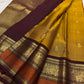 Golden Turmeric pure silk Kanchipuram saree, Butta weave with Deep Aubergine border — pallu detail