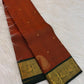 Burnt Orange and Forest Green handwoven pure silk Kanchipuram Butta saree by Idam Living