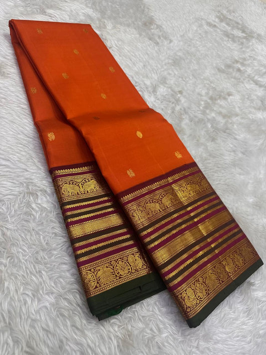Burnt Orange Kanchipuram silk saree with aubergine Korvai elephant zari border — Idam Living