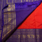 Burnt Orange pure silk Kanjivaram Korvai saree with Royal Purple contrast border.