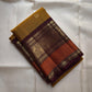 Golden Turmeric pure silk Kanchipuram saree, Butta weave with Deep Aubergine border — body weave close-up