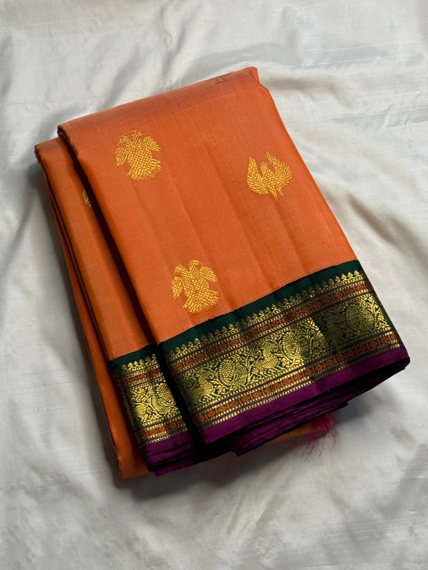 Burnt Orange Handwoven Pure Silk Kanjivaram Butta saree with Gandaberunda zari motifs