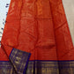 Burnt Orange Kanchipuram silk saree with fine antique-gold zari lines.