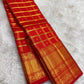 Vermilion Red Gold Checks pure silk Kanchipuram saree, silk body, showing brilliant kumkum red, warm vermilion orange highlights and glowing yellow-gold zari