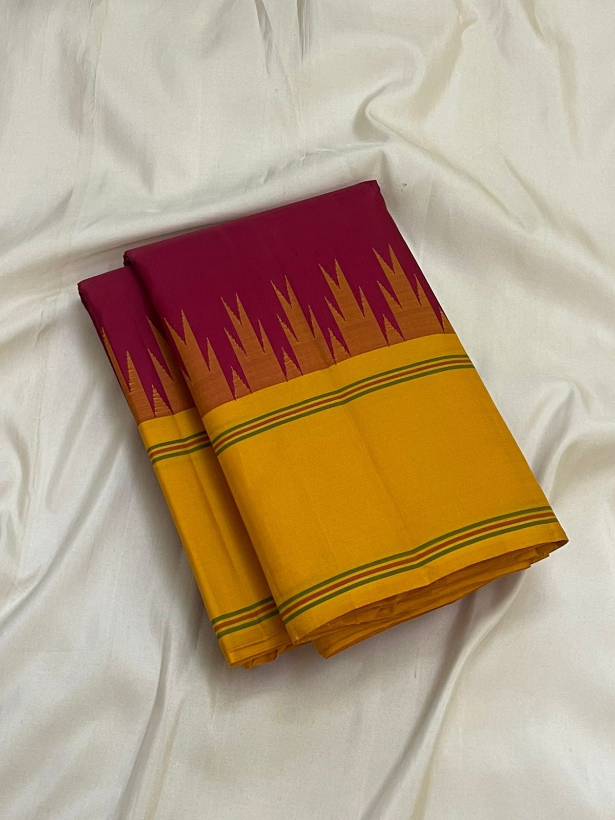 Deep arakku red and canary yellow handwoven pure silk Kancheepuram saree with Pattupet body and Thazhampoo Reku Korvai border overview