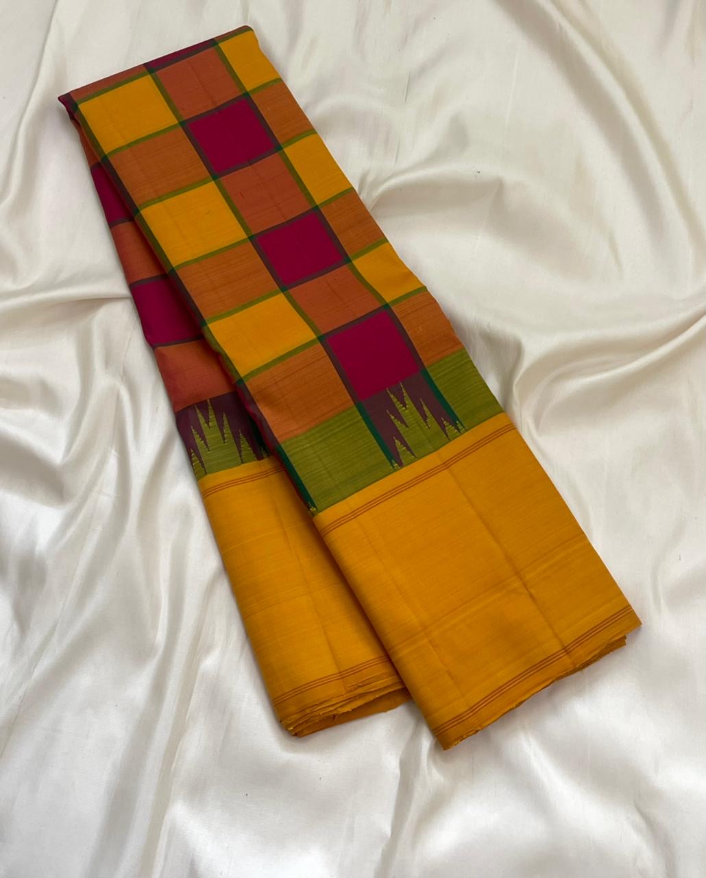 Canary yellow plain silk pallu of multicolour Kanchi Kattam Kanjivaram saree with Korvai interlocked border