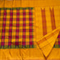 Handwoven canary yellow multicolour Kanjivaram pure silk saree with Kanchi Kattam checks and Korvai Thazhampoo Reku border