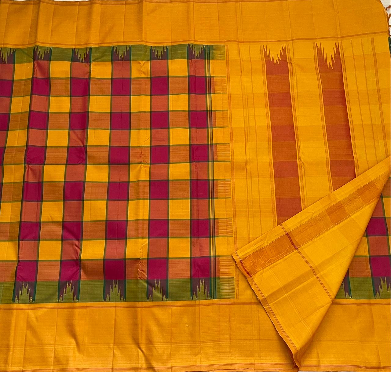 Handwoven canary yellow multicolour Kanjivaram pure silk saree with Kanchi Kattam checks and Korvai Thazhampoo Reku border