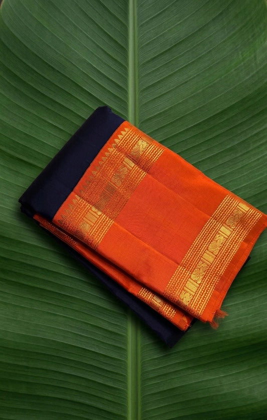 Celestial navy Kanchipuram silk saree with radiant red orange rettapet korvai border and antique gold zari