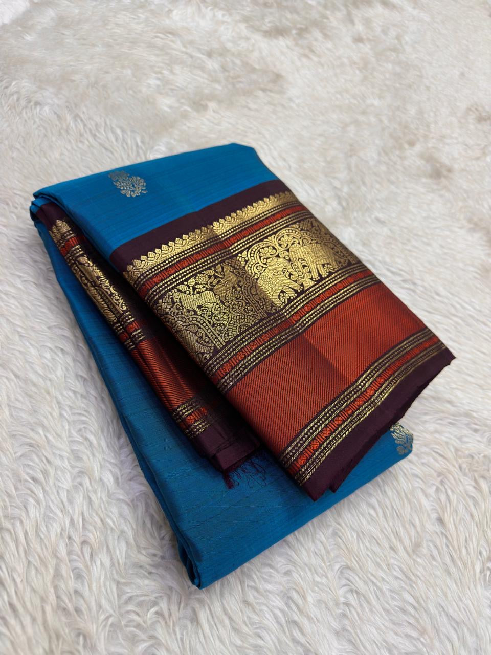 Cerulean Blue and Deep Plum Handwoven Pure Silk Kanjipuram Saree with Floral Butta and Varisaipet Border