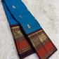 Cerulean Blue and Deep Plum Handwoven Pure Silk Kanjipuram Saree with Floral Butta and Varisaipet Border