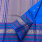 Crimson and teal pattupet border in gold zari on cerulean blue pure silk Kanchipuram saree — Idam Living