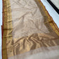 Handwoven beige silk Chanderi saree with gold detailing