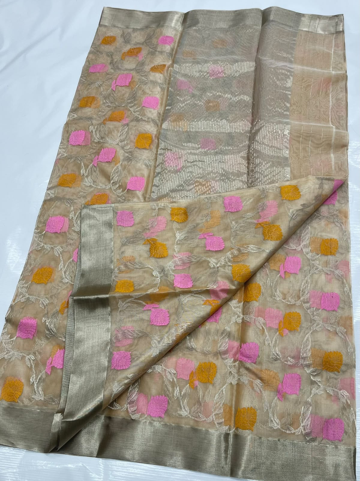 Handwoven beige Chanderi silk saree with silver-toned vine weaving