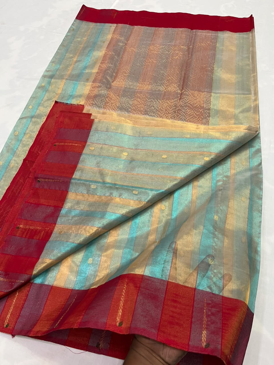 Close-up of shimmering Tissue Silk Jari weaving