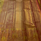 Champagne Gold Handwoven Pure Silk Kanjipuram Saree with Antique Rose Ornamental Border