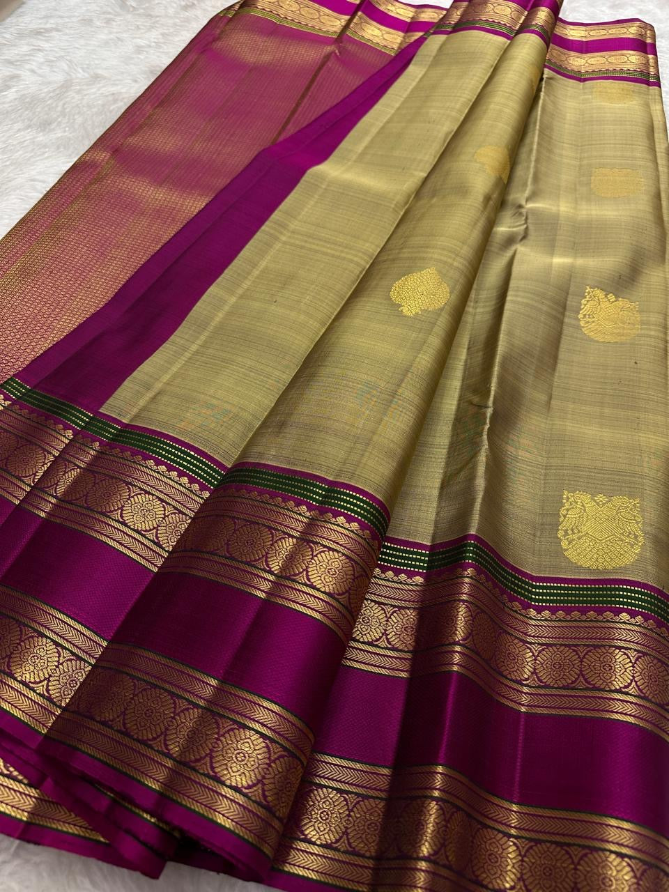 Champagne gold Rettapet body weave detail on pure silk saree.