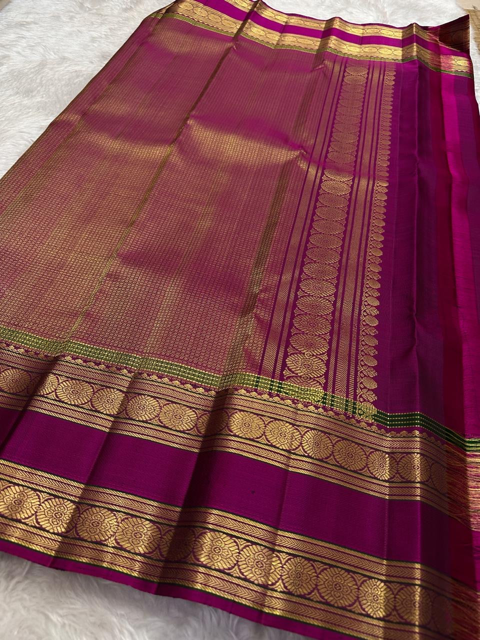 Champagne gold Rettapet saree, close view of the magenta border detail.