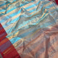 Handwoven blue and gold striped Chanderi silk saree