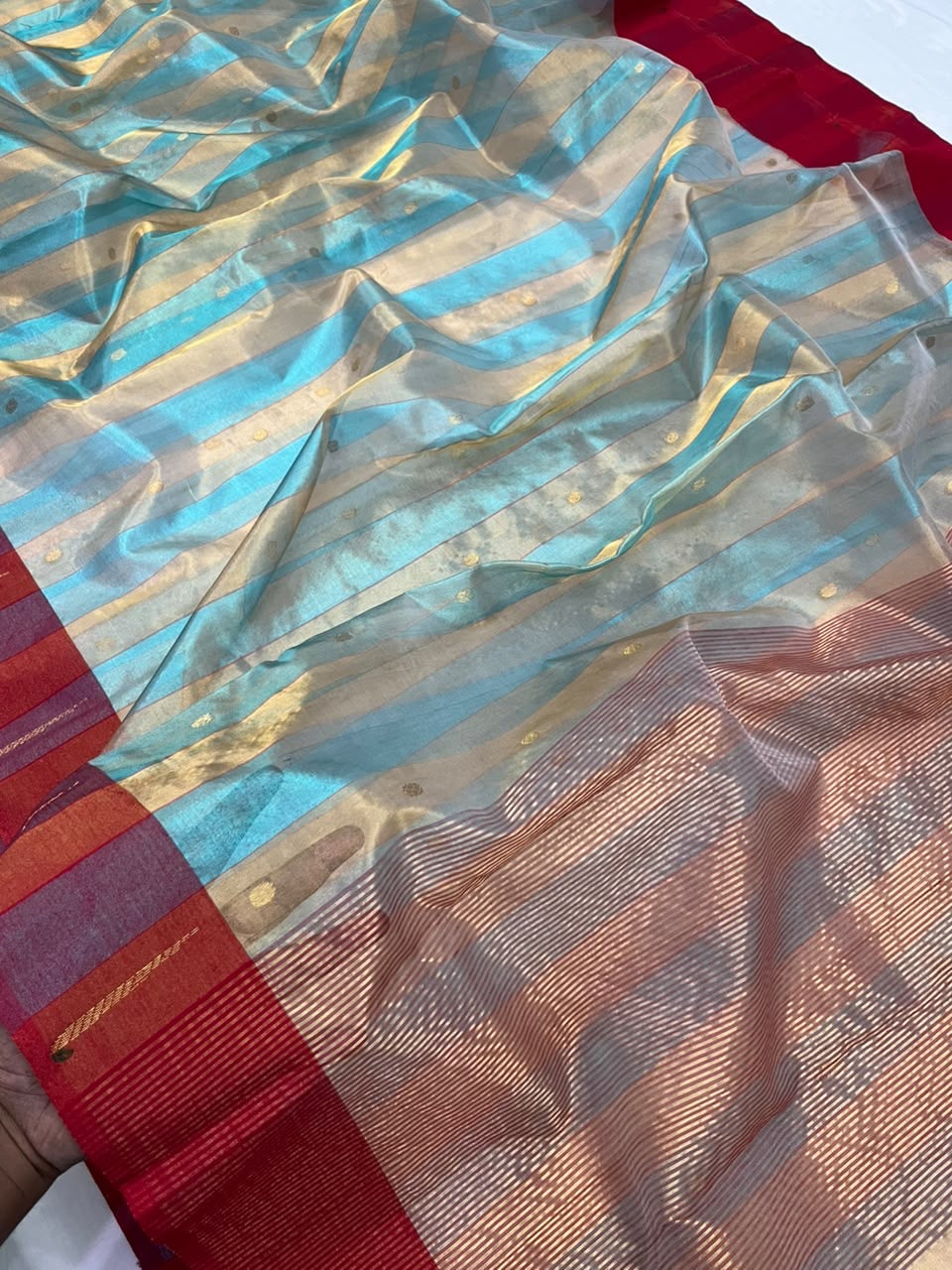 Handwoven blue and gold striped Chanderi silk saree