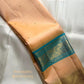 Front view of champagne peach and peacock teal Rettapet Kancheepuram saree