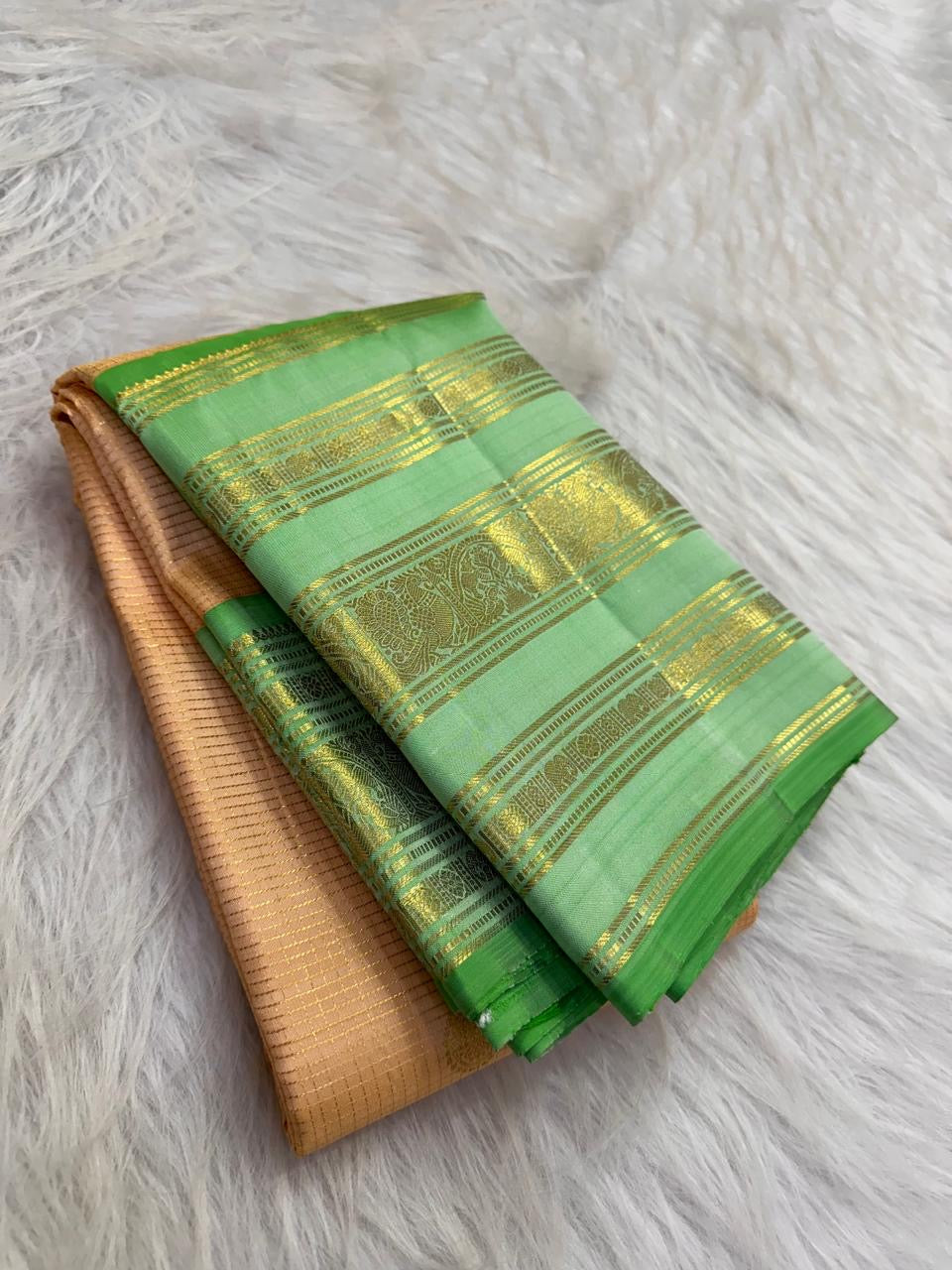 Champagne Peach Handwoven Pure Silk KanchiPattu Saree with Varisaipet Weave and Mint Green Zari Border