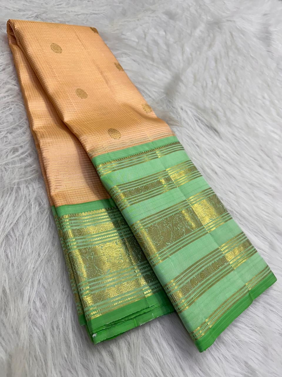 Champagne Peach Handwoven Pure Silk KanchiPattu Saree with Varisaipet Weave and Mint Green Zari Border