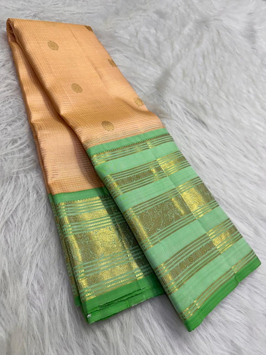 Champagne Peach pure silk KanchiPattu saree, Varisaipet weave with Mint Green Zari border — blouse piece detail