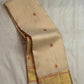 Full view of the Chandanam handwoven pure silk Kanchipuram butta saree with meenakari orange kamalam buttas and Sorgavaasal border.