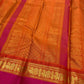 Pure silk Chandanam saree displaying the calm ivory body against its high-visual orange border.