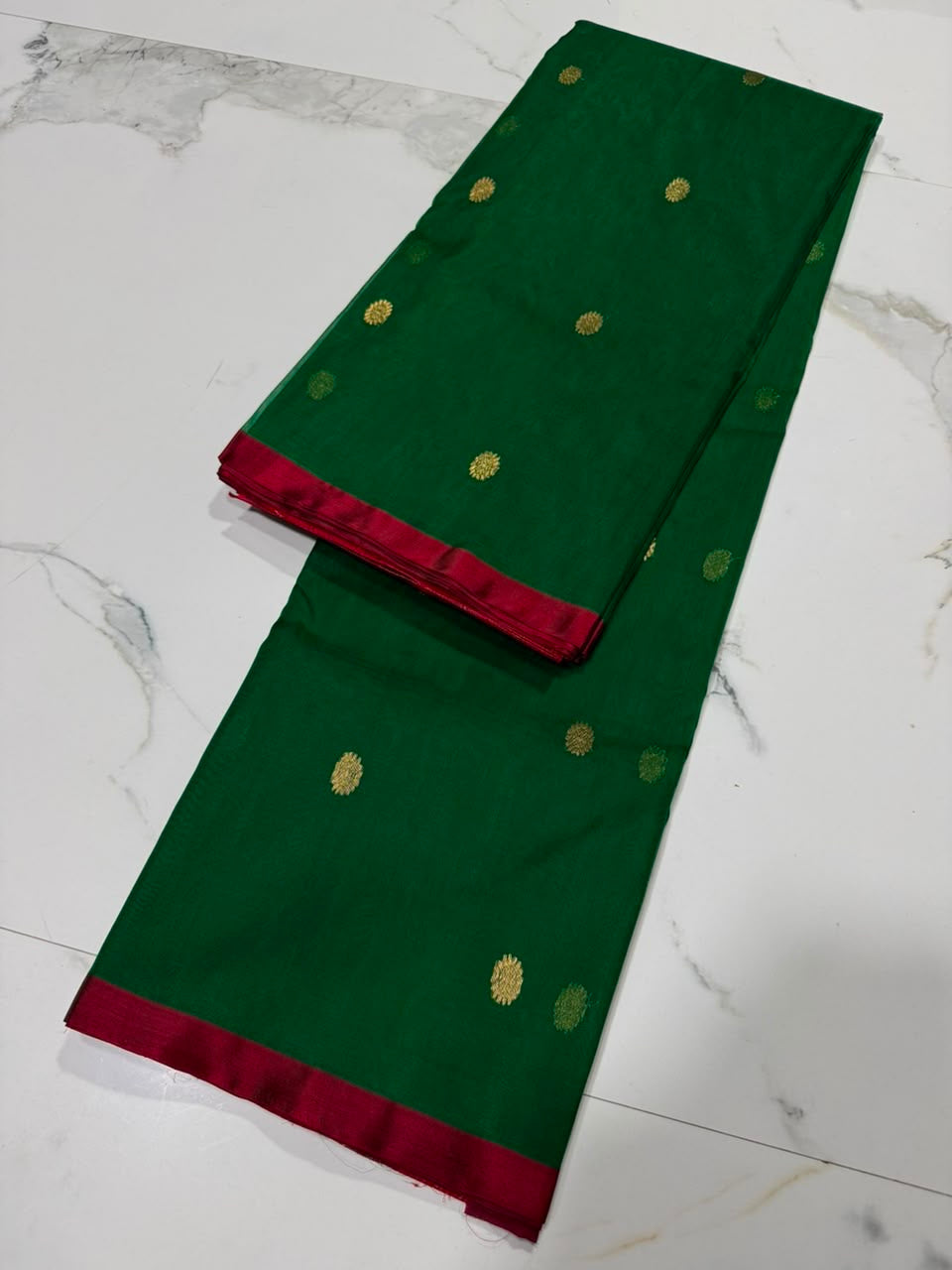 Fresh green Chanderi Katan silk saree, folded view