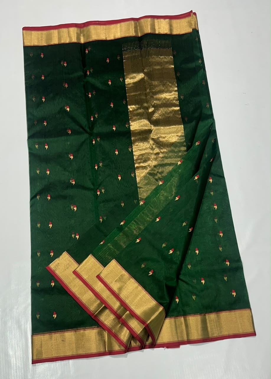 Gold zari border with red edge on emerald green Chanderi saree