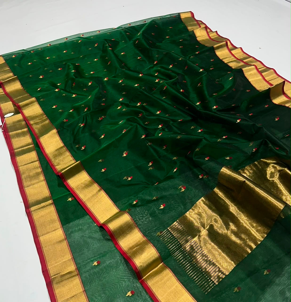Emerald green Chanderi Pattu silk saree, folded view