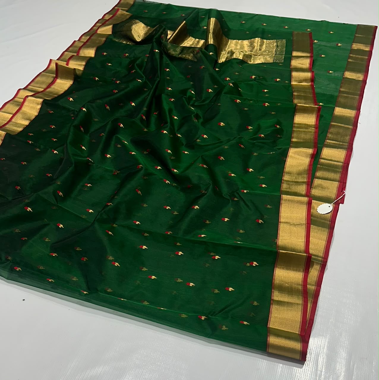 Emerald green Chanderi Pattu silk saree, zari detail close-up