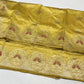Golden yellow Chanderi Pattu silk saree, folded view