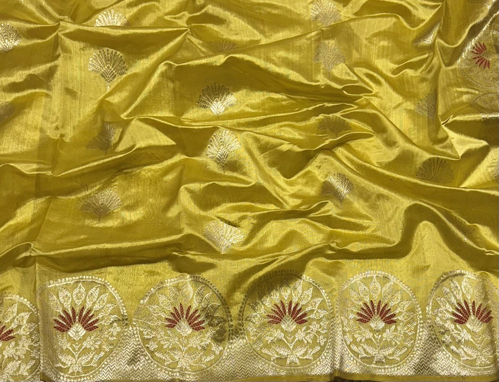Golden yellow Chanderi Pattu silk saree, zari medallion border close-up