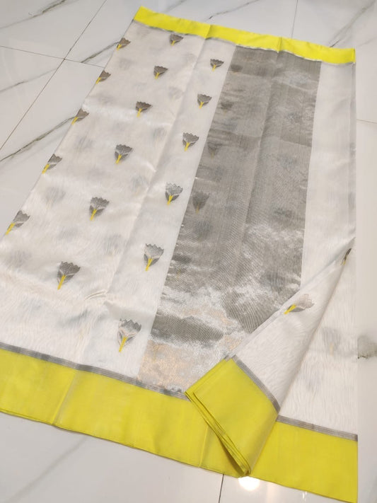 Ivory Chanderi saree with grey floral-bud motifs, lemon-yellow border and broad silver-toned woven pallu