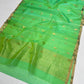 Sea glass green Chanderi saree showing the fresh green shot silk body, gold-toned butis and textured pallu