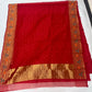 Vermilion red Katan Silk Chanderi saree with tiny gold butis